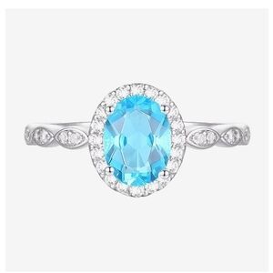 Genuine Blue Topaz Sterling Silver Oval Cocktail Ring